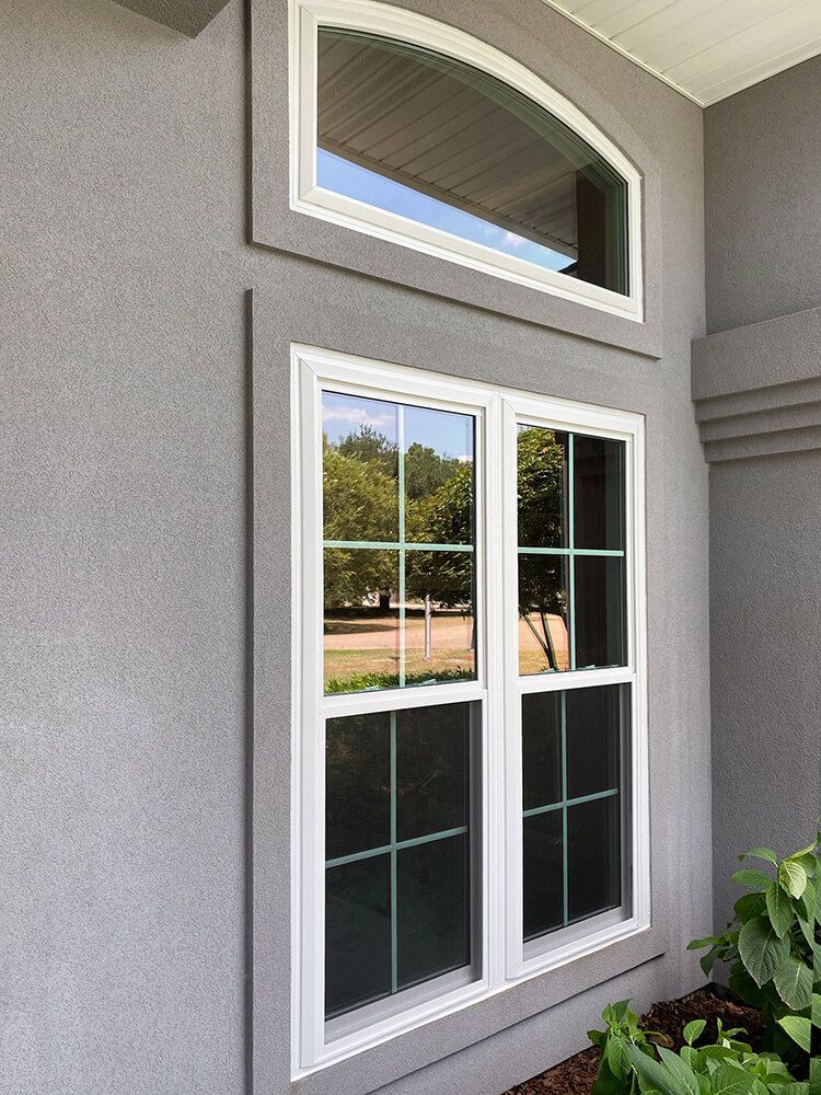 Replacement windows on a home exterior