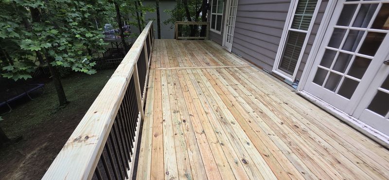 Wood deck boards and railing up close — Diaz project